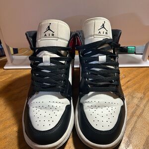 Jordan Black and White High-Top Sneakers